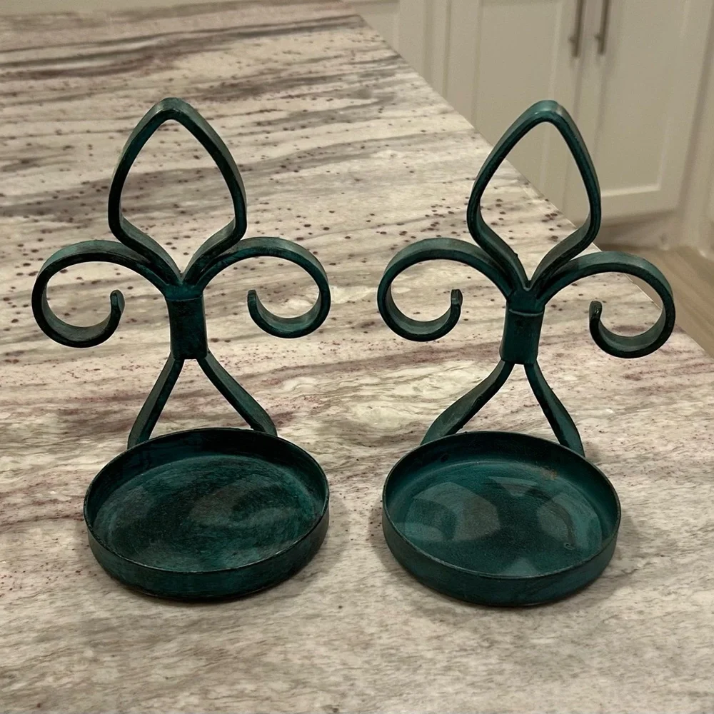 Two metal teal sconces